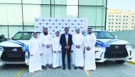 D. Anand, QIB’s General Manager, Personal Banking Group, with the winners.