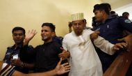 Accused people are taken out of the court premises after they were given death sentences in a murder case in Feni, Bangladesh, October 24, 2019. REUTERS/Stringer
