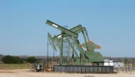 A pump jack used to help lift crude oil from a well in South Texas stands idle in Dewitt County, Texas January 13, 2016. Reuters/Anna Driver