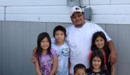 Tyson McKay, of the northern Manitoba indigenous community of Cross Lake, poses with his nieces and nephews in the fall of 2014.  Kelvin McKay via Reuters. 
