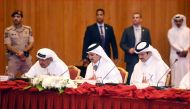 Sheikh Faisal bin Qassim Al Thani (left), Chairman of the Qatari Businessmen  Association;  Sheikh  Khalifa  bin  Jassim  Al  Thani  (centre), Chairman  Qatar Chamber; Ahmed bin Mohammed Al Sayed, Minister of State and Chairman of Qatar Free Zones Authori