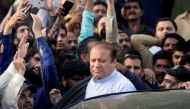 FILE PHOTO: Former Prime Minister Nawaz Sharif, who was temporarily released from prison, arrives to attend funeral services for his wife, Kulsoom, in Lahore, Pakistan September 14, 2018. REUTERS/Mohsin Raza/File Photo