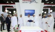Yousef Al Naama (fourth right), CEO of malomatia, with Oman ICT Group CEO Eng Said bin Abdullah Al Manthri (fifth right) during the MoU signing ceremony at QITCOM yesterday. 