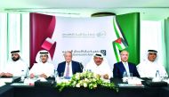 QBA Chairman Sheikh Faisal bin Qassim Al Thani (third right), Sheikh Dr. Khalid bin Thani Al Thani (second left), Second Deputy to the Chairman, QBA, and other officials during the event, yesterday.