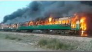 A fire burns a train carriage after a gas canister passengers were using to cook breakfast exploded, near the town of Rahim Yar Khan in the south of Punjab province, Pakistan October 31, 2019, in this still image take from video. REUTERS