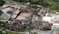 An aerial view shows the burned down Shuri Castle, listed as a World Heritage site, in Naha on the southern island of Okinawa, Japan October 31, 2019, in this photo taken by Kyodo. Mandatory credit Kyodo/via REUTERS