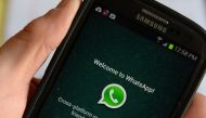 In this file photo taken on February 20, 2014 logo of WhatsApp, the popular messaging service bought by Facebook for USD $19 billion, is seen on a smartphonein New York. AFP / Stan Honda
 