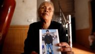 Anna Tran Thi Giao, grandmother of Vietnamese Joseph Nguyen Dinh Luong who is one of the suspected victims of the 39 people found dead in a refrigerated truck in Britain, reacts at her home in Ha Tinh province, Vietnam October 27, 2019. Reuters/Kham