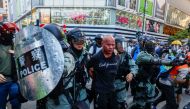 Riot policemen detain a man in Causeway Bay district before a protest march in Hong Kong, China November 2, 2019. REUTERS/Thomas Peter