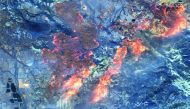 A shortwave infrared (SWIR) satellite image shows the Kincade fire near Healdsburg, California, U.S. October 27, 2019 in this picture obtained by Reuters on October 31, 2019. Maxar Technologies via REUTERS. 