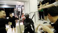 Riot police officer detains a protester at a shopping mall in Tai Po in Hong Kong, China November 3, 2019. REUTERS/Kim Kyung-Hoon