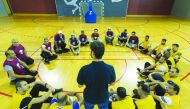 Participants attend a lecture during a two-day coaching seminar organised at Aspire Academy in preparation for the new season.
