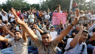 Delhi policemen shout slogans during a protest after clashes erupted between police and lawyers last week outside their headquarters in New Delhi, India, November 5, 2019. REUTERS/Adnan Abidi