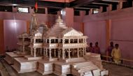 Devotees look at a model of the proposed Ram temple that Hindu groups want to build at a disputed religious site in Ayodhya, India, October 22, 2019. REUTERS/Danish Siddiqui