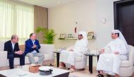 The President of Qatar Olympic Committee H E Sheikh Joaan bin Hamad Al Thani and QOC Secretary-General Jassim Rashid Al Buenain during their meeting with the President of the International Shooting Sport Federation   Vladimir Lisin during a meeting held i