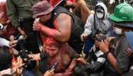 The mayor of the Bolivian town of Vinto and member of his ruling Movement for Socialism (MAS) party, Patricia Arce, speaks to the press as she is being humiliated by a mob of opposition supporters, in Vinto, close to Cochabamba, on November 6, 2019. AFP 