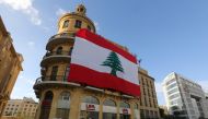 A Lebanese flag hangs from a building in downtown Beirut, November 21, 2017. Reuters / Aziz Taher