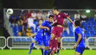 Qatari forward Mekki Mohsen Tombari scoring his second goal against Turkmenistan during their AFC U-19 Championship match yesterday.