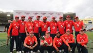 England's cricket team celebrate winning the series after the 5th Twenty20 cricket match between New Zealand and England at Eden Park in Auckland on November 10, 2019. / AFP / MICHAEL BRADLEY

