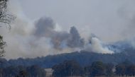 Smoke from a large bushfire is seen outside Wytaliba, near Glen Innes, Australia, November 10, 2019. AAP Image/Dan Peled/via REUTERS 