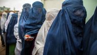 Afghan women stand in line while waiting for their turn to vote at a polling station in Mazar-i-sharif April 5, 2014. Reuters/Zohra Bensemra