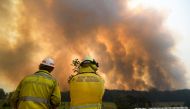 Smoke from a large bushfire is seen outside Nana Glen, near Coffs Harbour, Australia, November 12, 2019. AAP Image/Dan Peled/via REUTERS