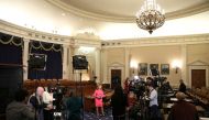 Television news crews set up for live reports ahead of Trump impeachment inquiry testimony by Ambassador Bill Taylor, charge d'affaires at the U.S.  REUTERS/Jonathan Ernst