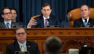 Democratic Counsel Daniel Goldman (C), alongside Chairman Adam Schiff (R), Democrat of California, asks questions of witnesses US Ambassador to Ukraine William Taylor and Deputy Assistant Secretary George Kent during the first public hearings held by the 