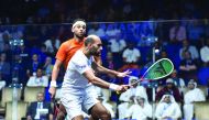 Egypt’s Marwan El Shorbagy (right) in action against Mohammed El Shorbagy in yesterday’s PSA World Championship quarter-final at the Khalifa International Tennis and Squash Complex in Doha.