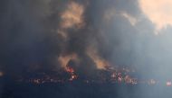 The Gospers Mountain fire is seen burning in bushland near Colo Heights, north west of Sydney, Australia, November 13, 2019. AAP Image/Dan Himbrechts/via REUTERS