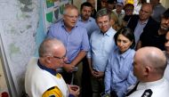 Australia's Prime Minister Scott Morrison and New South Wales Premier Gladys Berejiklian receive a briefing on the fires at Mid North Coast Fire Control Centre in Wauchope, New South Wales, Australia, November 10, 2019. AAP Image/Darren Pateman/via Reuter