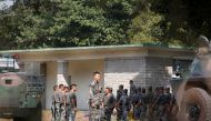 People's Liberation Army (PLA) vehicles and troops are seen inside the Tam Mei PLA base in Hong Kong's northern New Territories, China November 16, 2019. REUTERS/James Pomfret