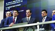 Sheikh Dr. Khalid bin Thani Abdullah Al Thani (third left), QIIB Chairman and Managing Director; Dr. Abdulbasit Ahmad Al Shaibei (fourth left), QIIB CEO; and other officials during QIIB’s Sukuk listing on London Stock Exchange.