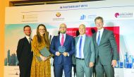 The senior officials and awardees posing for a group picture at the Qatar Business Law Awards ceremony held at The St. Regis Hotel in Doha on November 12, 2019.