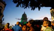 People wait for fireworks during the celebrations of the 500th anniversary of the city, Havana, Cuba, November 16, 2019. Reuters/Alexandre Meneghini