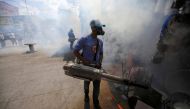 A municipal worker fumigates a market to prevent the spread of dengue fever and other mosquito-borne diseases in Tegucigalpa, Honduras, July 25, 2019. Reuters/Jorge Cabrera