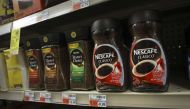 Nescafe coffee products of Nestle sit on the shelf at a CVS Pharmacy store, May 7, 2018, in New York City. Drew Angerer / Getty Images / AFP