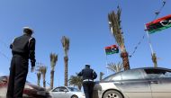 File photo of Libyan traffic police directing cars during an operation at the Martyrs Square in Tripoli on March 12, 2019. AFP / Mahmud Turkia.jpeg 
