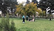 A family enjoys a picnic in Chihilsitoon Garden, which was restored after it was damaged during four decades of war in Kabul, Afghanistan. November 6, 2019. Thomson Reuters Foundation/Rina Chandran
