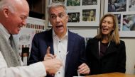 Republican 2020 US presidential candidate Joe Walsh, with his wife Helene at his side, files paperwork with New Hampshire Secretary of State Bill Gardner for his name to appear on the state’s first-in-the-nation primary ballot in Concord, New Hampshire, U