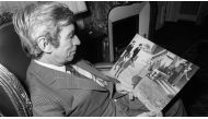 Comics author Georges Remi, also known as Hergé, reading his book “Tintin and the Lake of Sharks” on December 7, 1972. AFP 