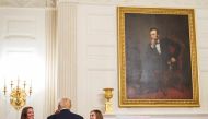 President Donald Trump speaks with members of the University of Wisconsin Madison women's hockey team during an 