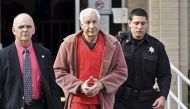 Convicted child molester Jerry Sandusky (C), a former assistant football coach at Penn State University, leaves after his appeal hearing at the Centre County Courthouse in Bellefonte, Pennsylvania, US on October 29, 2015. Reuters/Pat Little
 