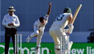 Pakistan's paceman Naseem Shah (C) bowls to Australia's batsman Marnus Labuschagne (R) on day two of the first Test cricket match between Pakistan and Australia at the Gabba in Brisbane on November 22, 2019. -- 
/ AFP / AFP / Saeed KHAN /
