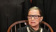 In this file photo taken on November 30, 2018 Associate Justice Ruth Bader ginsburg poses for the official photo at the Supreme Court in Washington, DC. Justice Ruth Bader ginsburg has been hospitalized November 23, 2019, after experiencing chills and fev