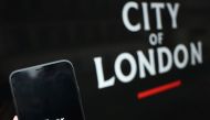 The uber logo is displayed on a mobile phone in this picture illustration taken November 25, 2019. REUTERS/Hannah McKay/Illustration
