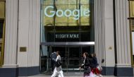 FILE PHOTO: People pass by an entrance to Google offices in New York, U.S., June 4, 2019. REUTERS/Brendan McDermid/File Photo
