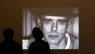 Representative image: (Visitors stand in front of the screen projecting videos of Joseph Beuys at the The Hamburger Bahnhof museum for contemporary arts in Berlin, October 1, 2008. Reuters / Pawel Kopczynski