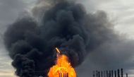 A process tower flies through air after exploding at the TPC Group Petrochemical Plant, after an earlier massive explosion sparked a blazeÊat the plant in Port Neches,ÊTexas, U.S., November 27, 2019.Ê REUTERS/Erwin Seba