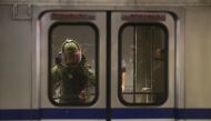 Representative image (A bomb squad officer in protective gear is seen entering the inside of a train carriage that was involved in a blast in Taipei on July 8, 2016. AFP